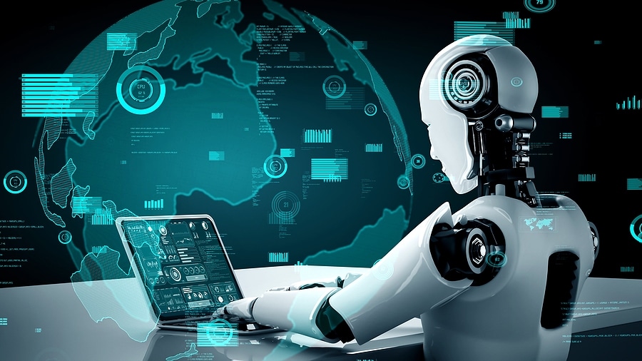 Picture of robot typing at a computer